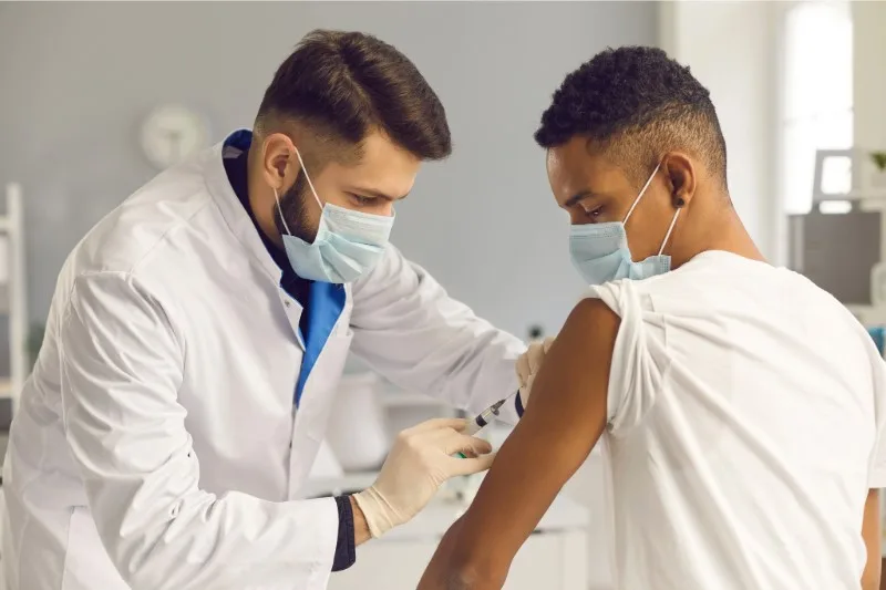 Flu shot being administered at Evergreen Compounding Pharmacy - Remedy'sRx in Calgary